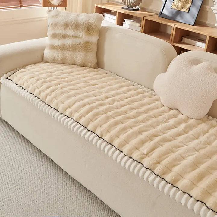 Machine washable fluffy couch cover in a solid beige, easy care home decor.