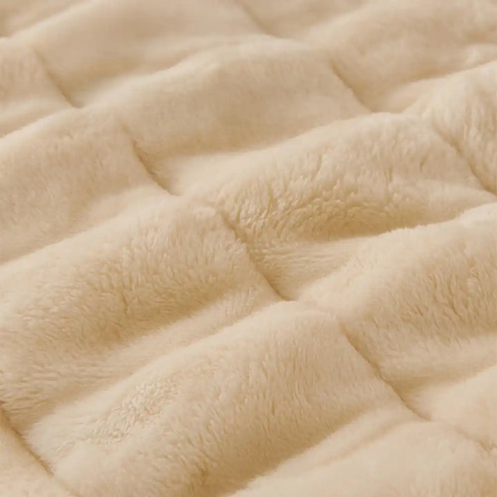 Close-up of fluffy texture of a solid color sofa cover, soft and pet-friendly.