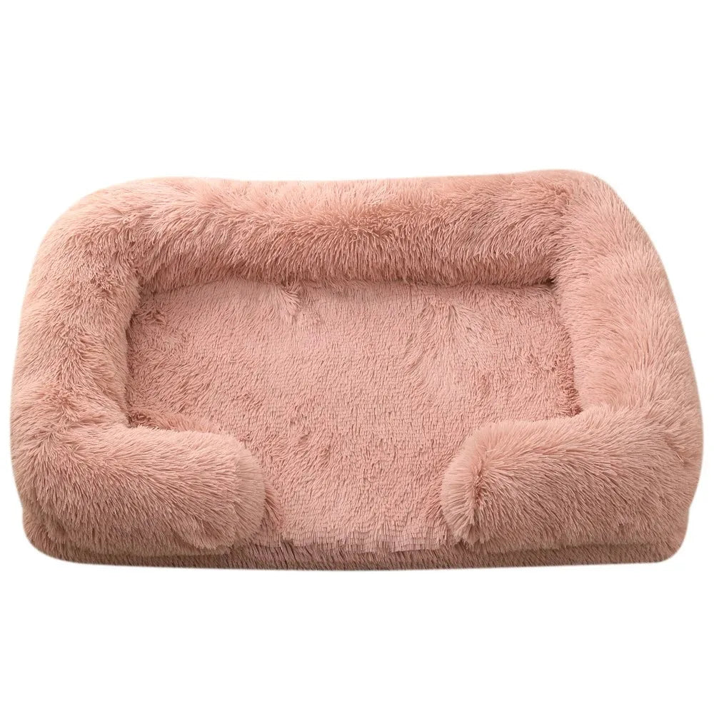 Lifestyle image: dog relaxing on a comfortable, washable, grey orthopedic bolster pet bed
