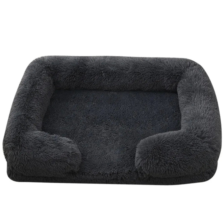 Close-up of plush grey fabric on orthopedic pet bed, washable cover, comfortable for pets