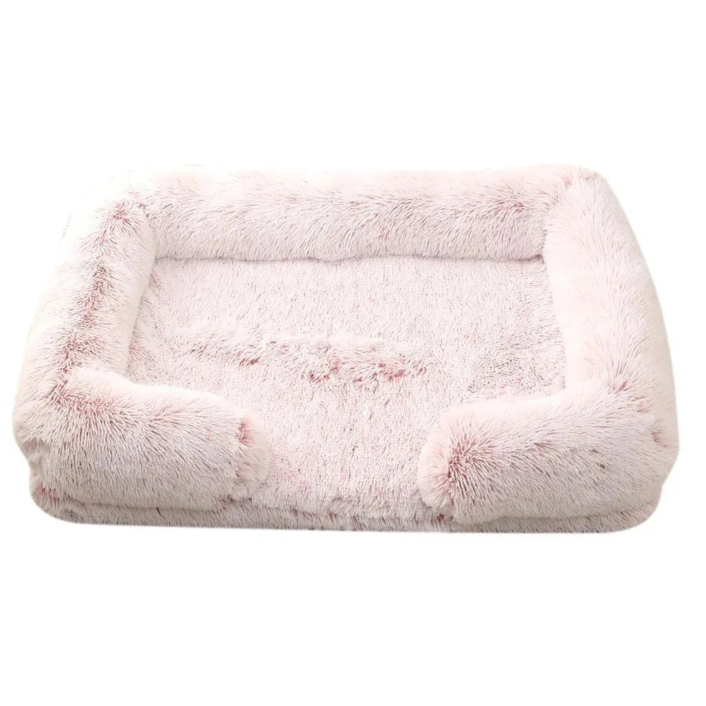 Orthopedic pet bed in living room, grey plush with bolster, washable cover, ideal for dog or cat