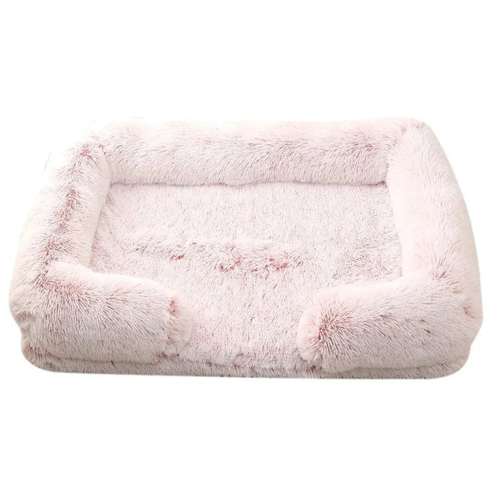 Orthopedic pet bed in living room, grey plush with bolster, washable cover, ideal for dog or cat