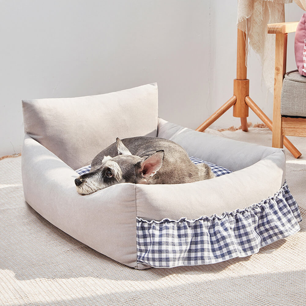 Plush grey pet sofa bed with elevated ruffled backrest, perfect for small to medium dogs and cats.