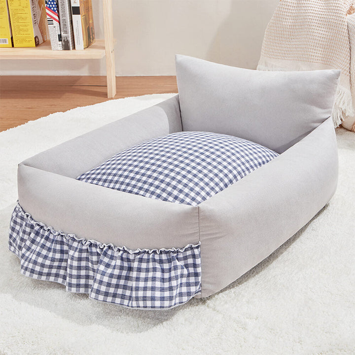 Modern pet furniture: durable pet sofa bed with elevated ruffled back, an excellent addition to pet supplies.