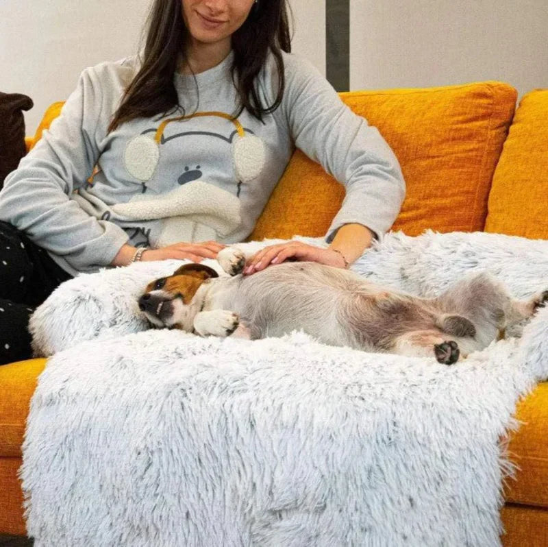Plush grey pet sofa bed with raised sides, offering luxurious comfort for dogs and cats, non-slip base