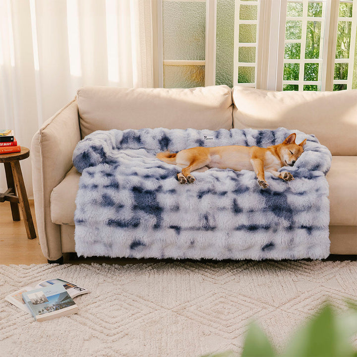 Texture shot of the plush material of a pet sofa protector and calming dog bed mat