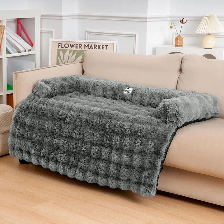 Fluffy beige pet sofa protector and calming dog mat, washable couch cover for dogs