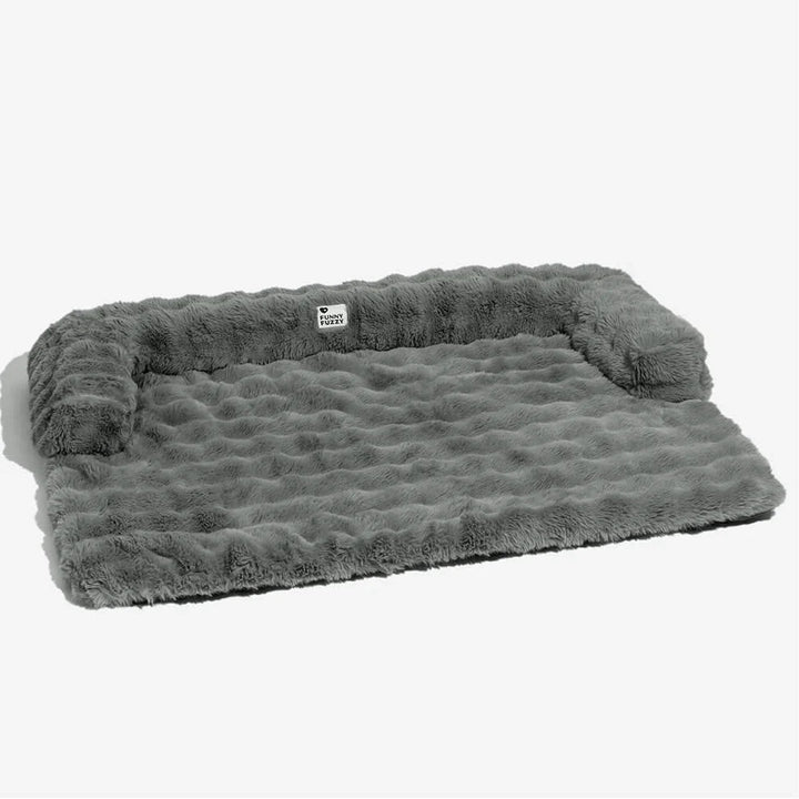 Brown pet sofa protector and calming dog bed mat from above, plush and washable couch cover