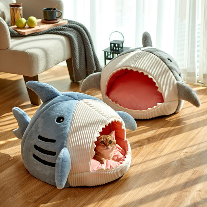 Plush grey shark cave cat bed with soft cushion, ideal for cozy pet naps