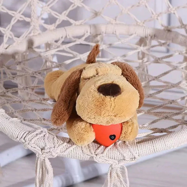 Beige heartbeat comfort toy for dogs, a plush anxiety relief aid and pet training tool.