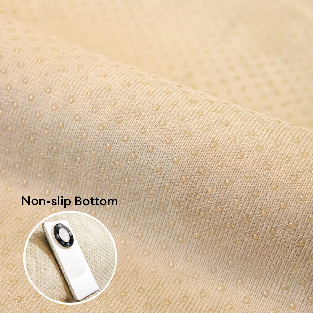 Durable non-slip sofa cover with plush jacquard weave, offering furniture protection.