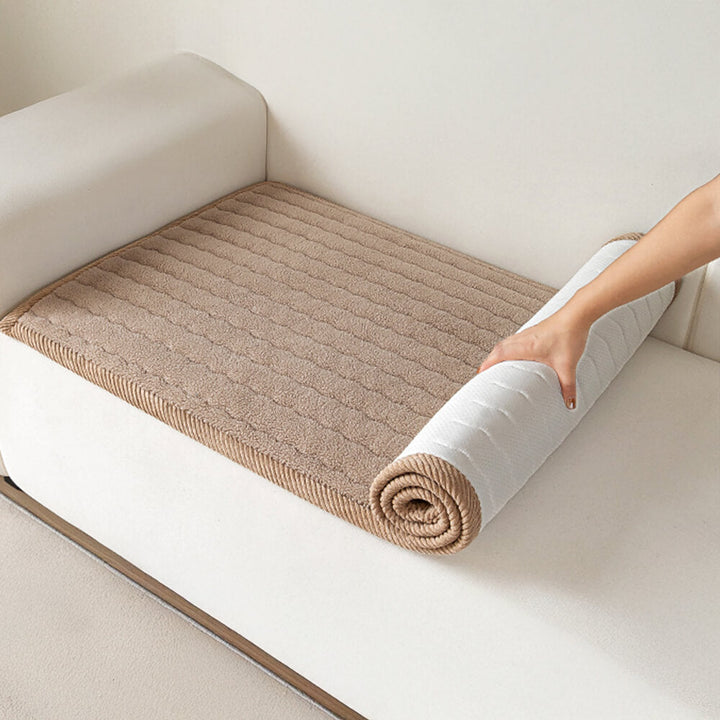 Elegant plush lambskin feel sofa cover in a neutral tone, enhancing living room decor