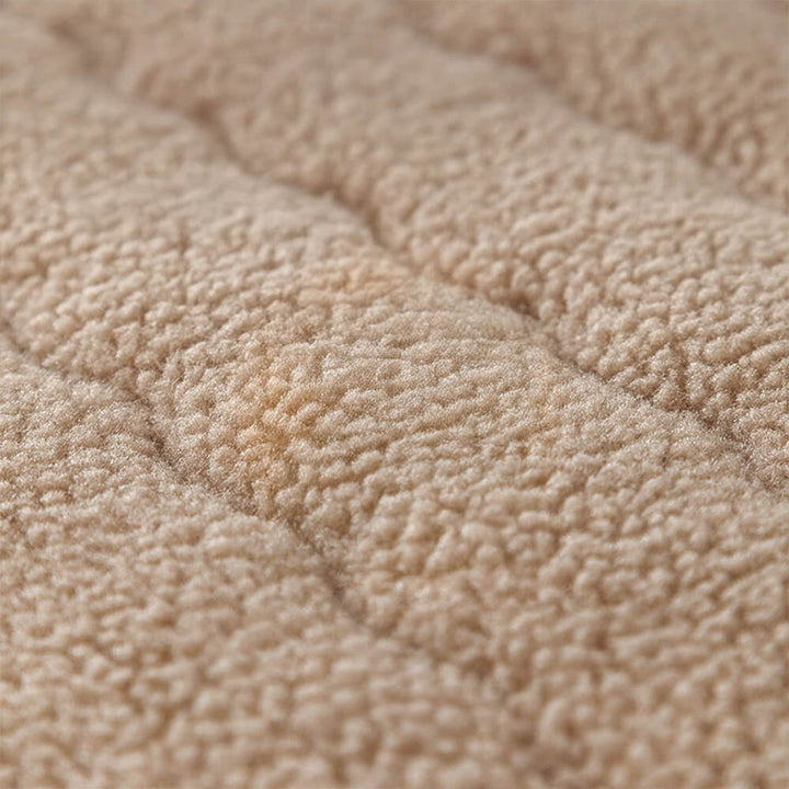 Top-down view of a plush lambskin feel sectional cover, fitting snugly on furniture