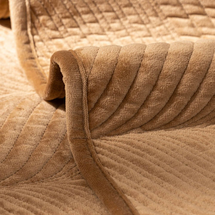 High-quality plush sofa cover with a distinctive leaf pattern, non-slip and easy clean.