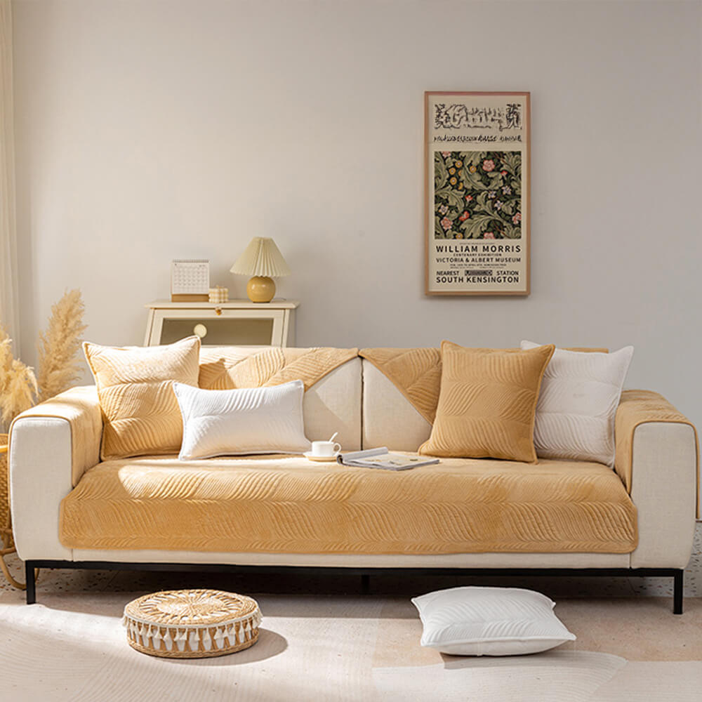 Modern plush sofa cover with a sophisticated leaf pattern, ensuring a non-slip and secure fit.
