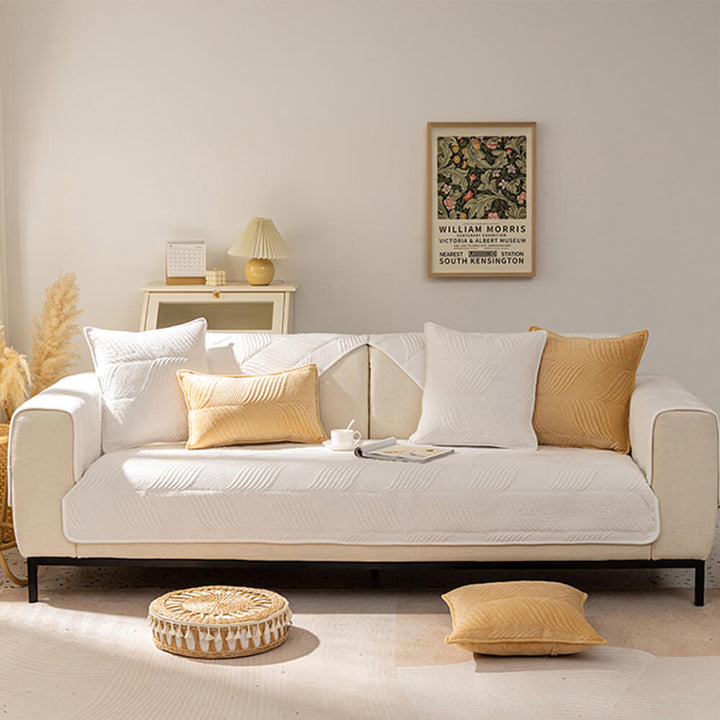 Easy clean plush couch cover with a beautiful leaf pattern, serving as a non-slip home decor item.