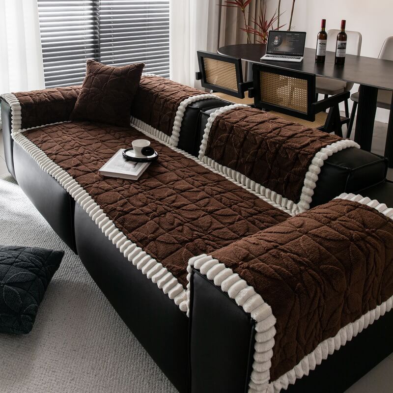 Living room sofa adorned with non-slip plush leaf pattern couch cover, home decor