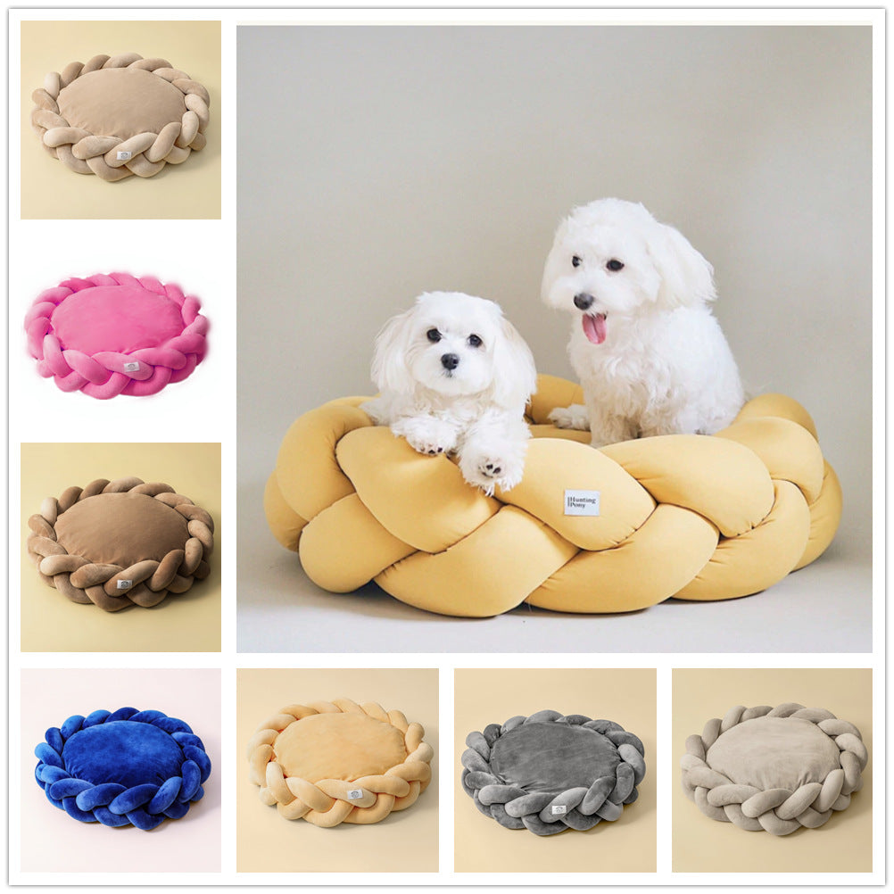 High-quality dog bed with plush interior and durable braided bolster for pet relaxation.