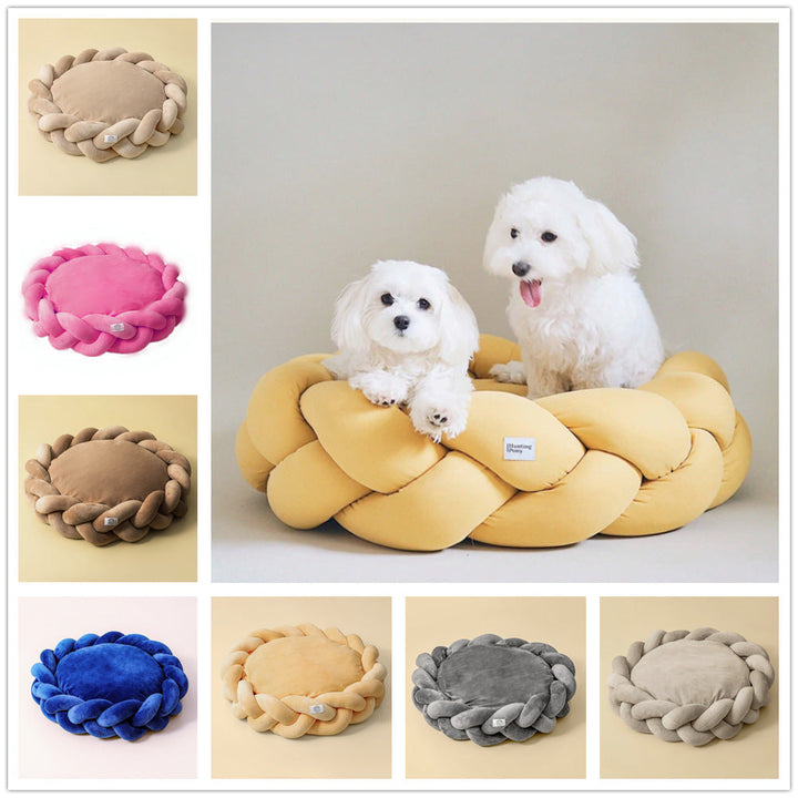High-quality dog bed with plush interior and durable braided bolster for pet relaxation.