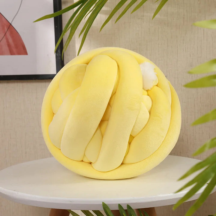 Close-up of the braided edge on a luxury plush dog bed, highlighting craftsmanship.