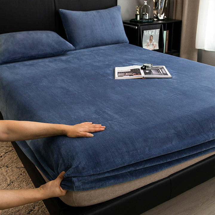 Plush milk velvet fitted sheet in a cozy room, offering ultimate comfort for a restful sleep.