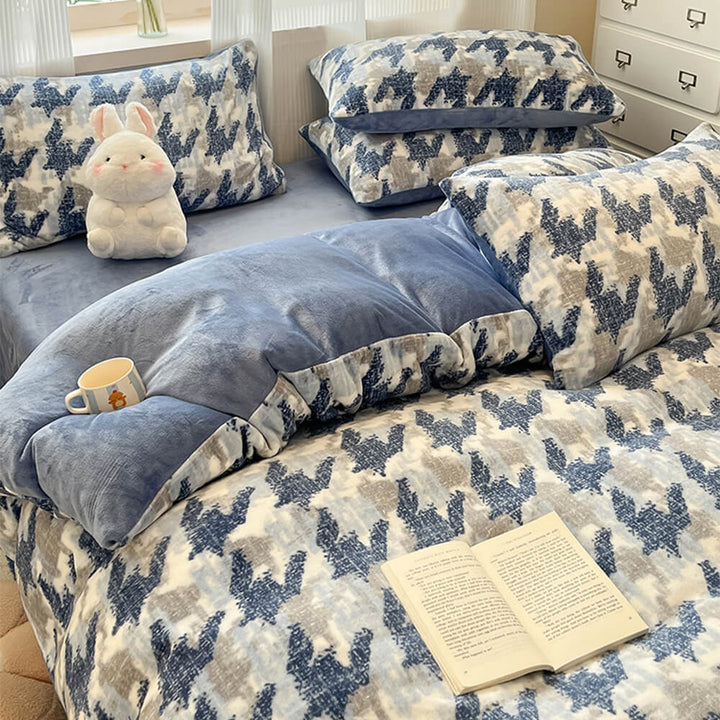 Plush milk velvet warm bed sheet set in a cozy bedroom with quilt cover and pillowcases