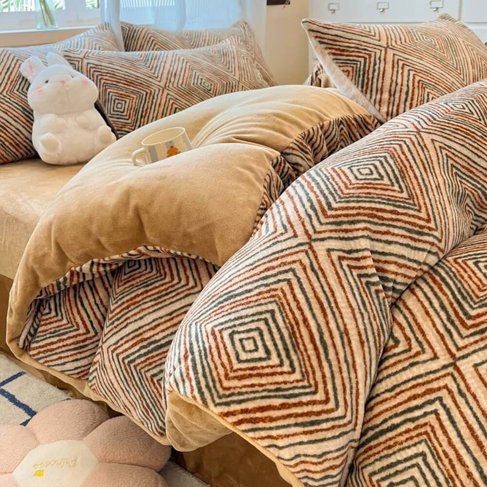 Assortment of milk velvet warm bedding items: duvet cover, fitted sheet, and pillowcases