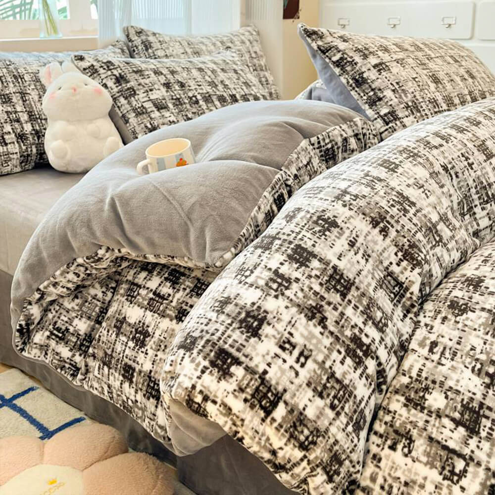 Full view of a bed dressed with a cozy milk velvet warm sheet set and quilt cover ensemble