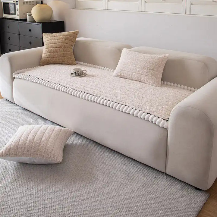 Close-up of the plush texture of a non-slip sofa cover, designed for comfortable home decor.