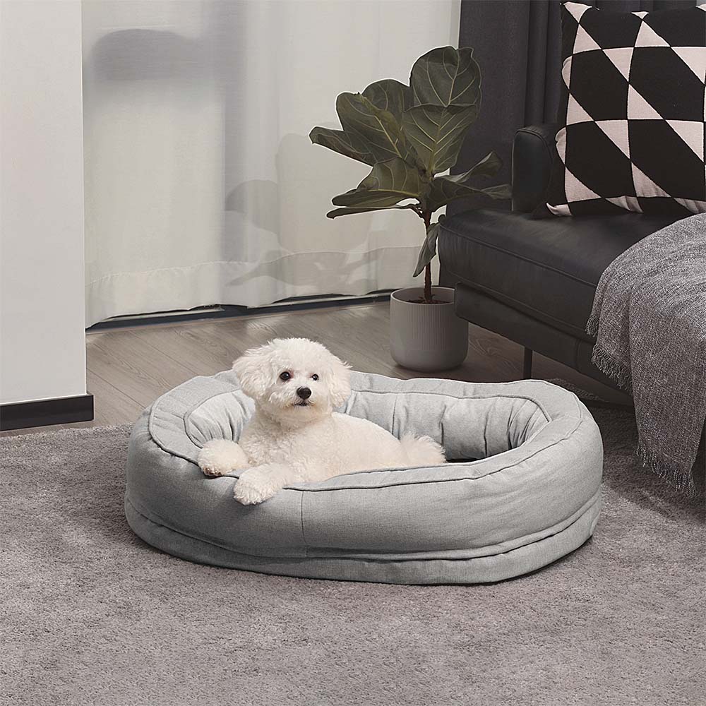 Cozy fluffy orthopedic dog bed, washable and warm, for all-around pet comfort.