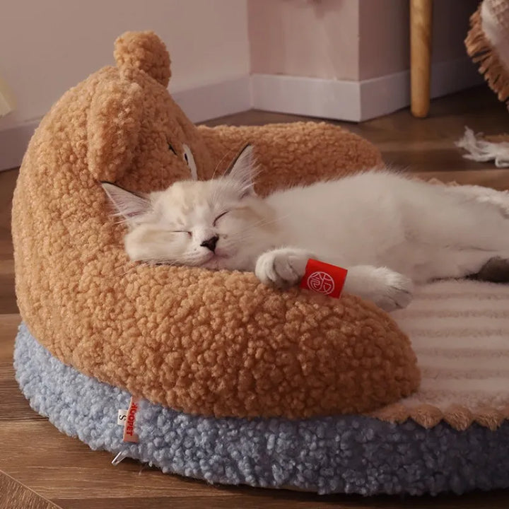 Soft gray plush pet bed with a high backrest, providing ultimate comfort for small pets