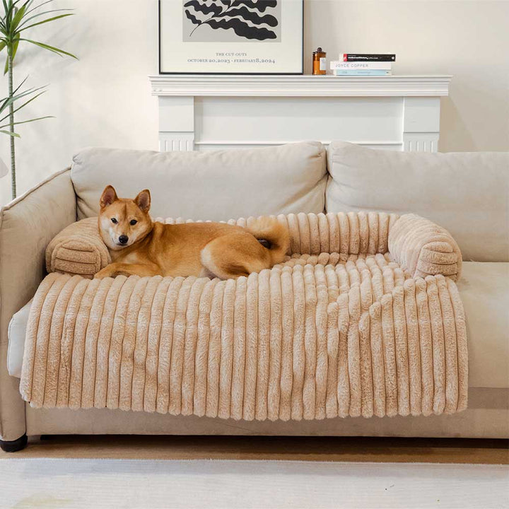 Comfortable dog mat couch cover in gray plush, featuring a bolster for head support, non-slip pet accessory.