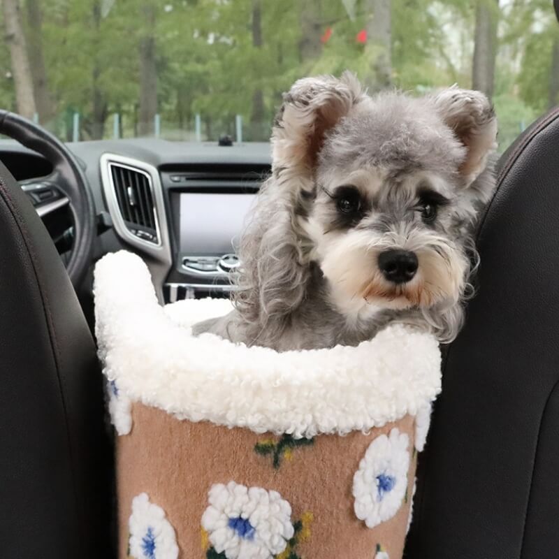 Beige flower wool fleece dog car safety seat providing a secure and comfortable travel for pets.