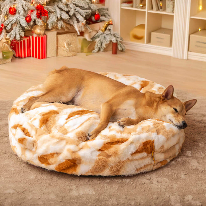 Plush round dog bed, fluffy and calming for pets, washable material in a cozy design.