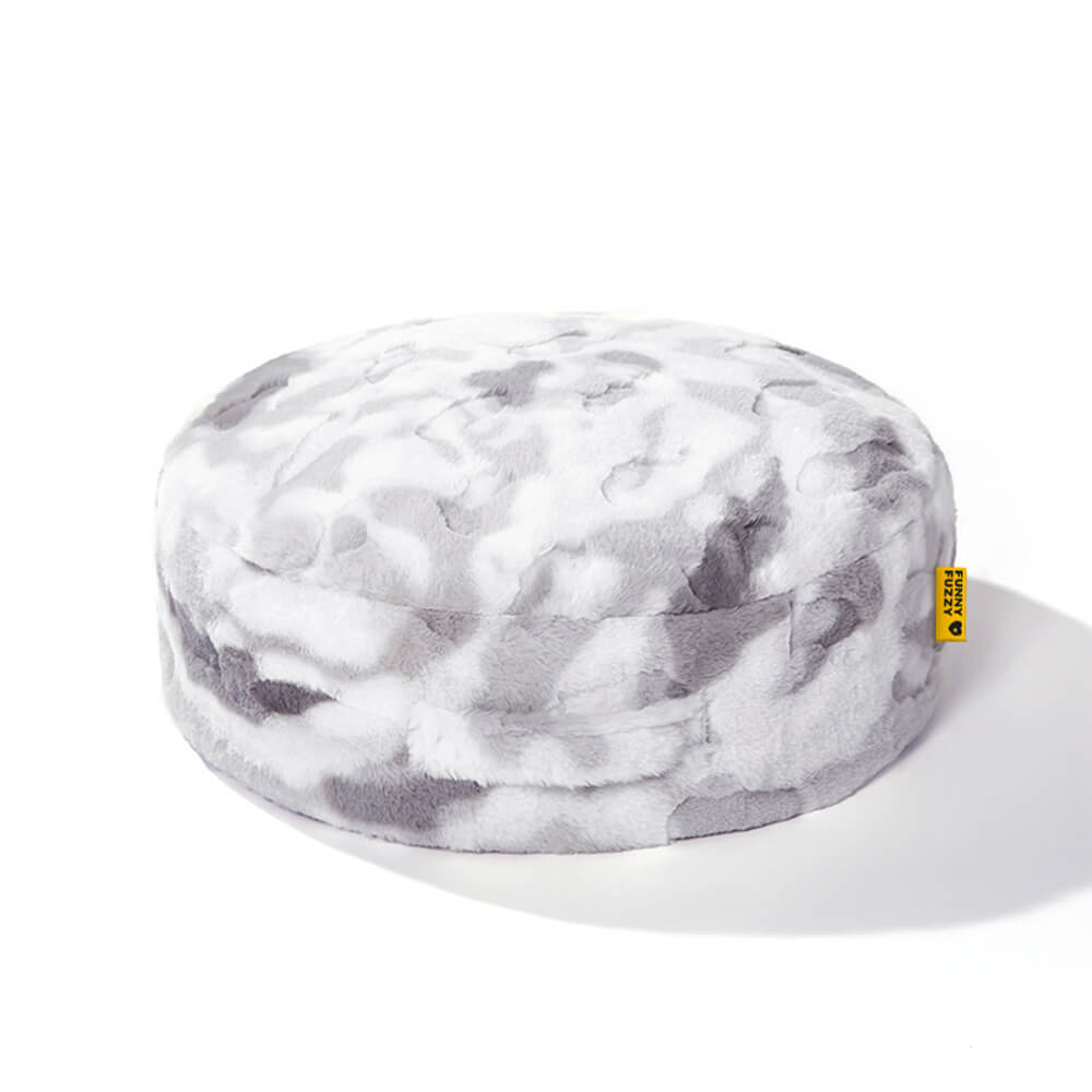 Luxury pet bed, round and fluffy, a cozy haven for your furry friend.