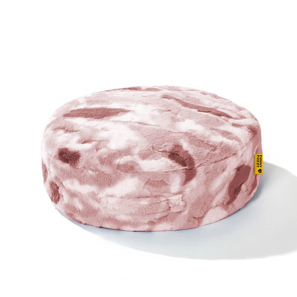 Compact round pet bed, soft and calming for small dogs and cats.