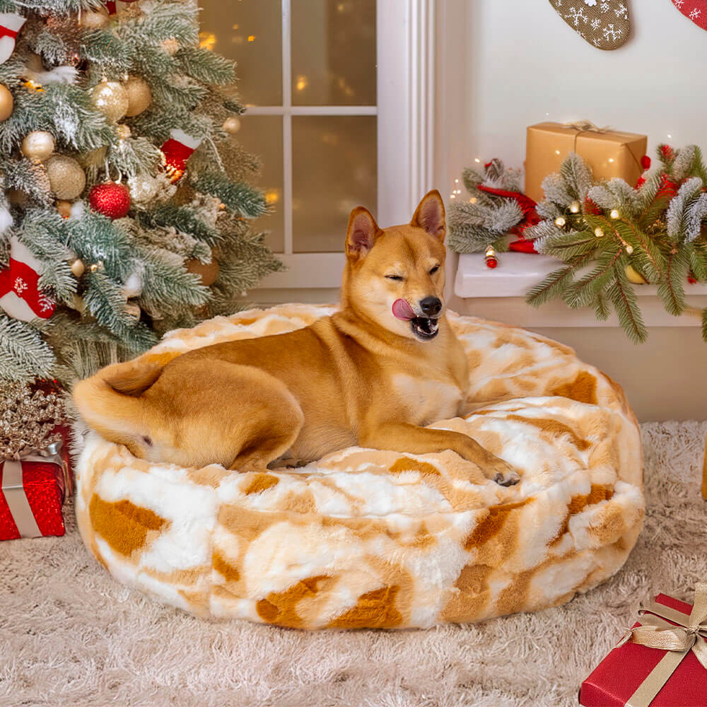 Soft, round pet bed for dogs and cats, featuring a cozy, fluffy design.