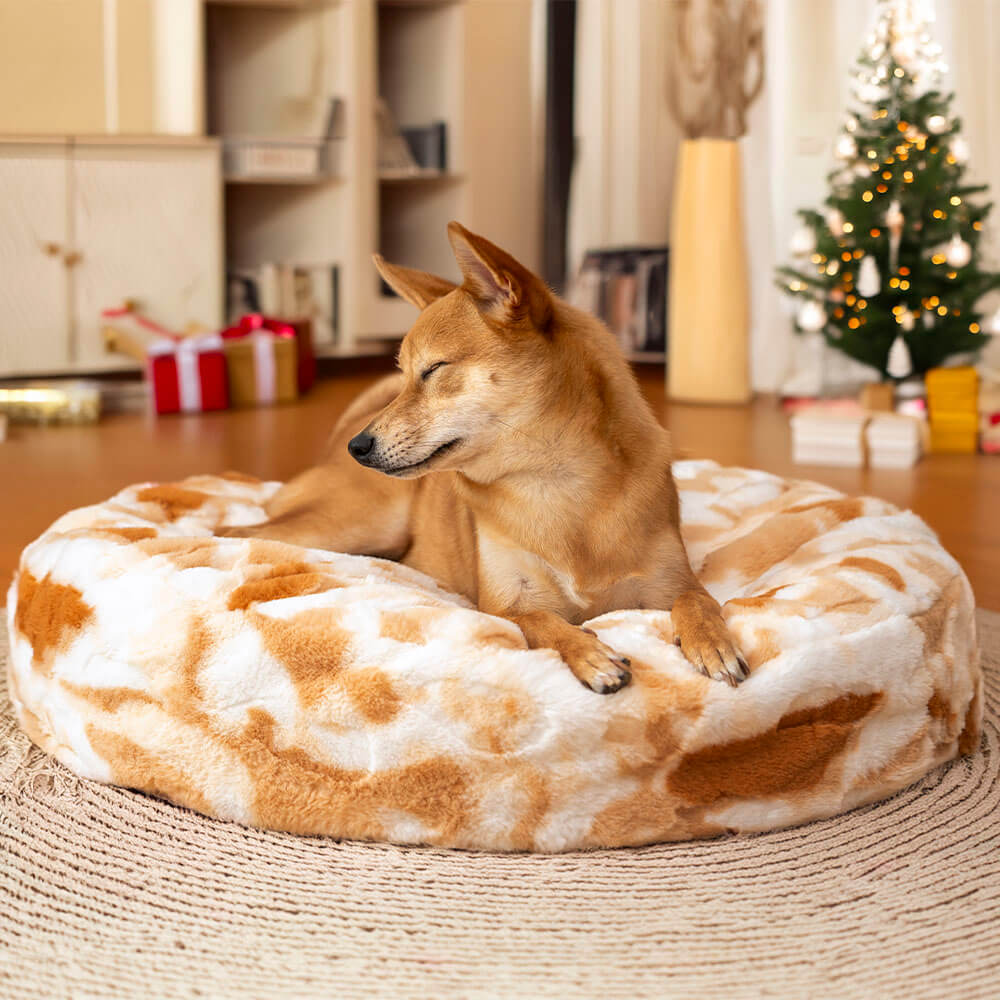 Comfortable round dog bed, super soft plush, ideal for napping and relaxing.