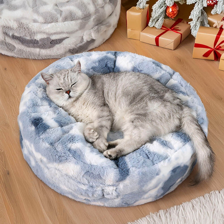 Fluffy pet bed in a round design, provides calming support for dogs and cats.