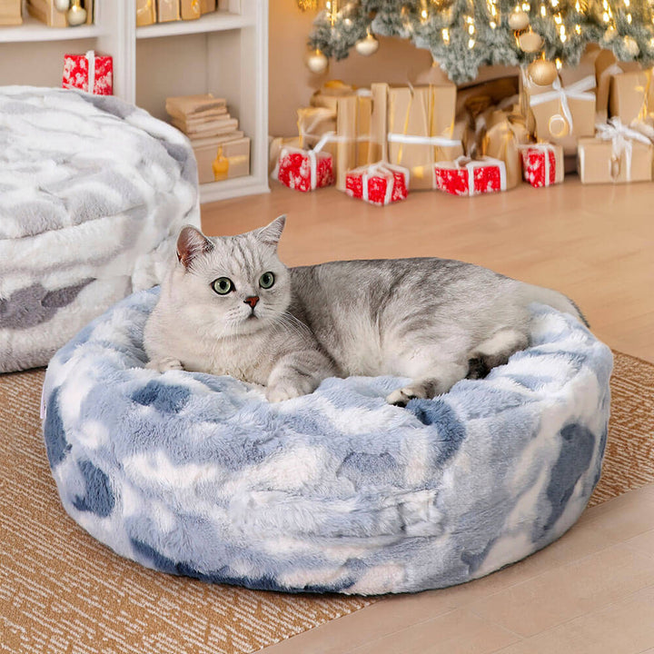 Cozy round dog bed with deep crevices for ultimate comfort and security.