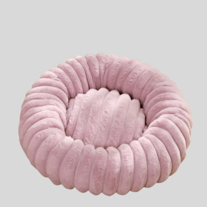 New pet bed for dogs, ultra-soft and machine washable, providing a cozy sleep spot.