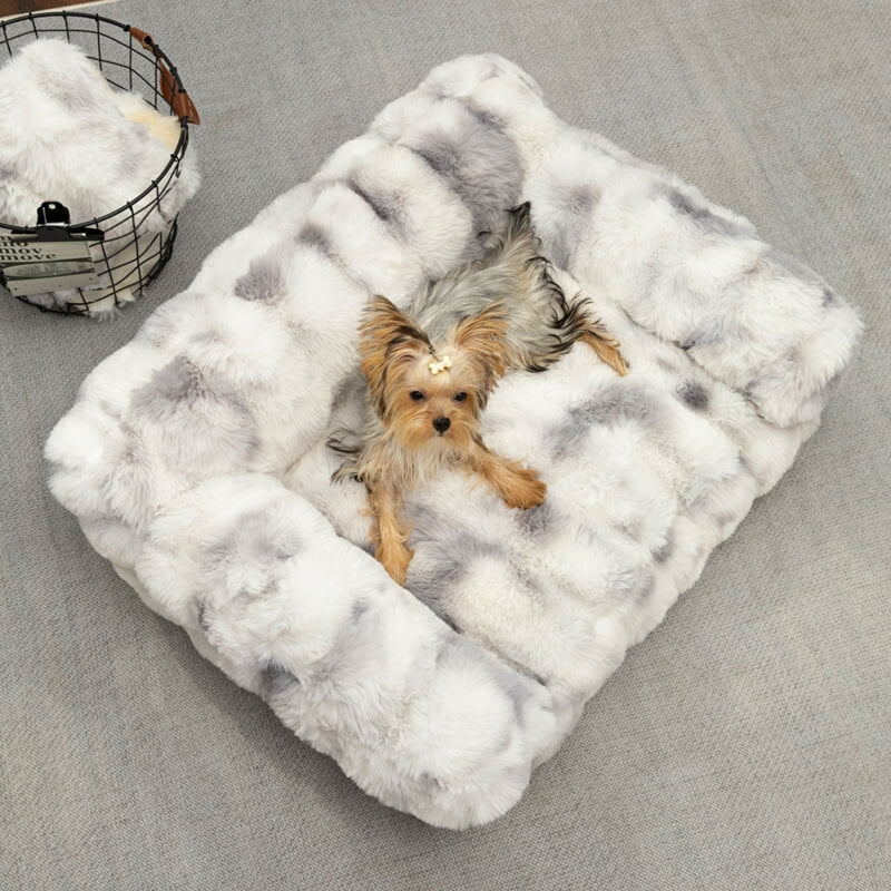 Close-up of fluffy pet bed fabric, showing soft texture, anti-anxiety pet supplies for dog or cat.