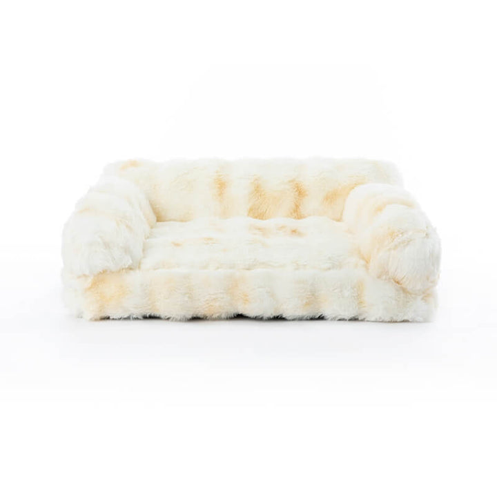 Cat nestled into a soft, round pet soothing bed, comfortable and washable pet furniture.