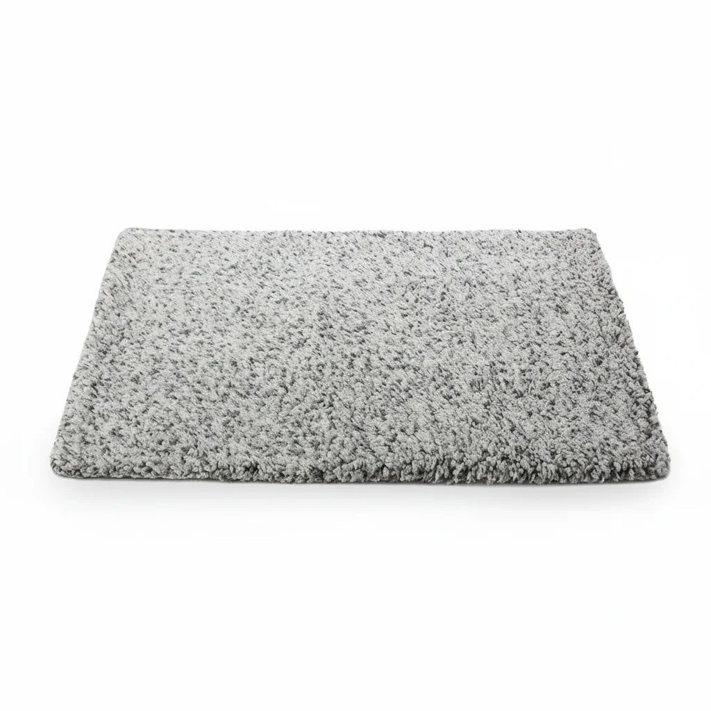 Plush self-heating pet mat providing cozy comfort for cats and dogs, machine washable sleep pad.