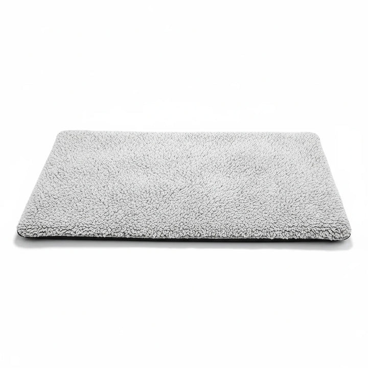 Stylized image of a self-warming pet bed, fitting home decor while offering pet comfort. Cozy pet.
