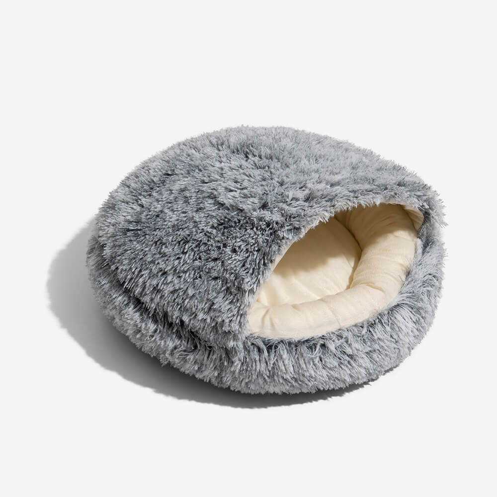 Side profile of the cozy pet nest bed, emphasizing the enclosed design for a secure dog sleep.