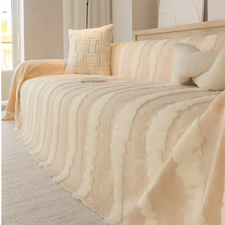 Multifunctional plush blanket for sofa protection, detailing its soft fabric and secure fit for living room.