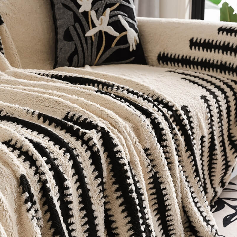 Close-up of the plush texture of a sofa couch cover, highlighting its soft and luxurious feel