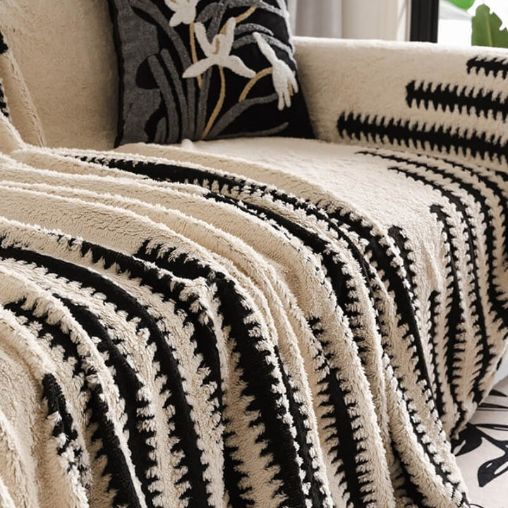 Close-up of the plush texture of a sofa couch cover, highlighting its soft and luxurious feel