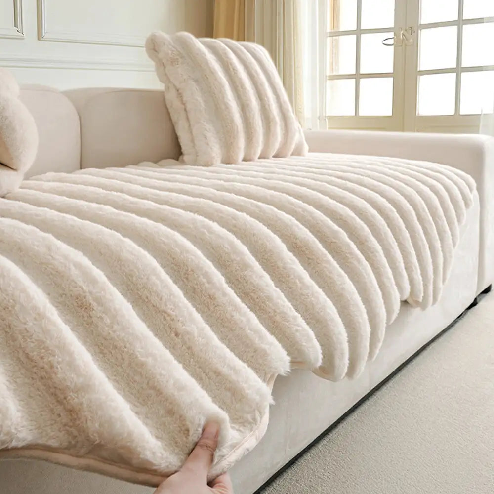 Stylish plush furniture protector, enhancing living room decor while protecting the sofa.